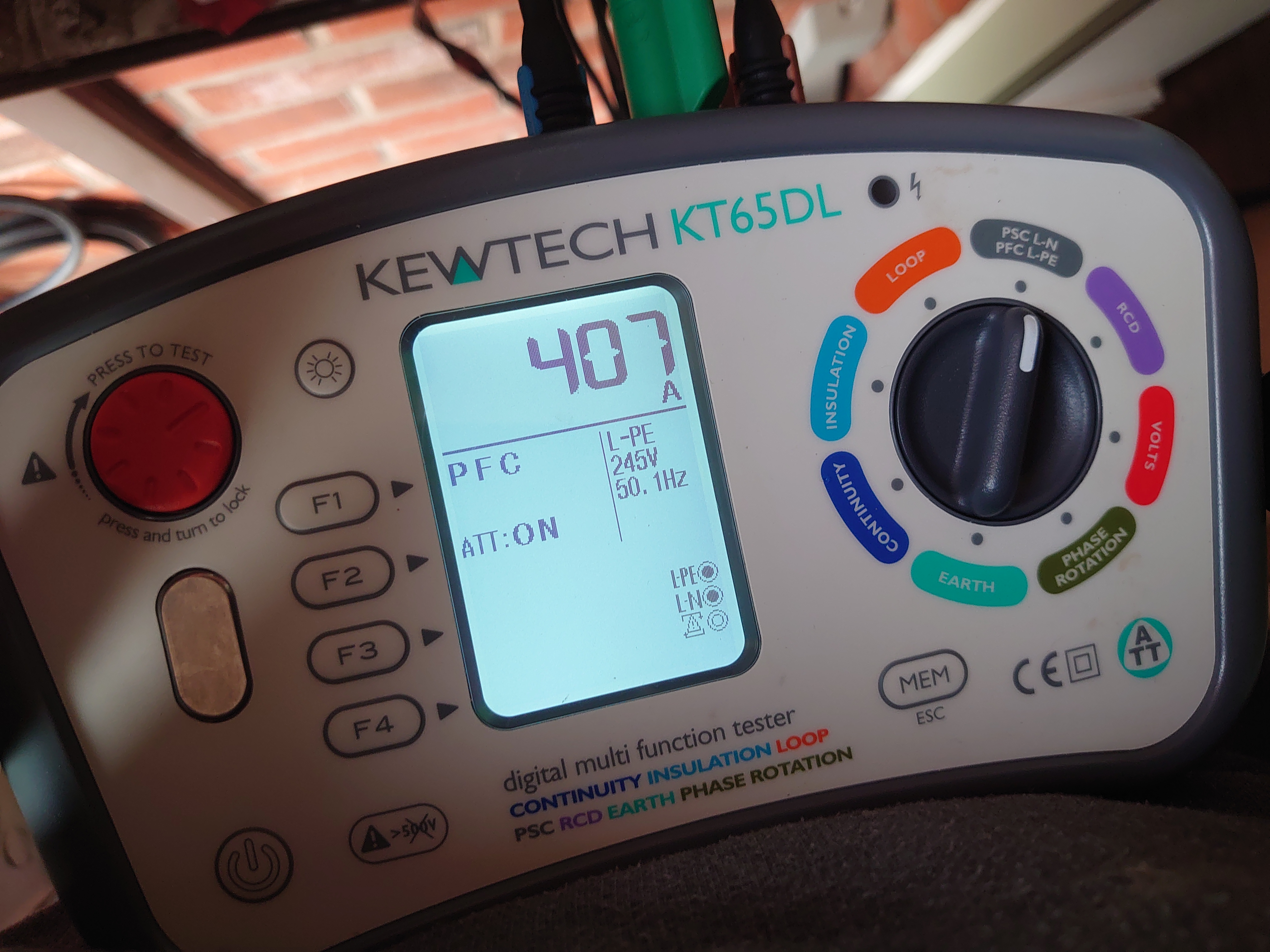Electrical testing meter showing live test results